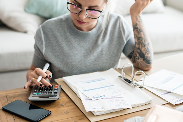 Woman with invoice bills